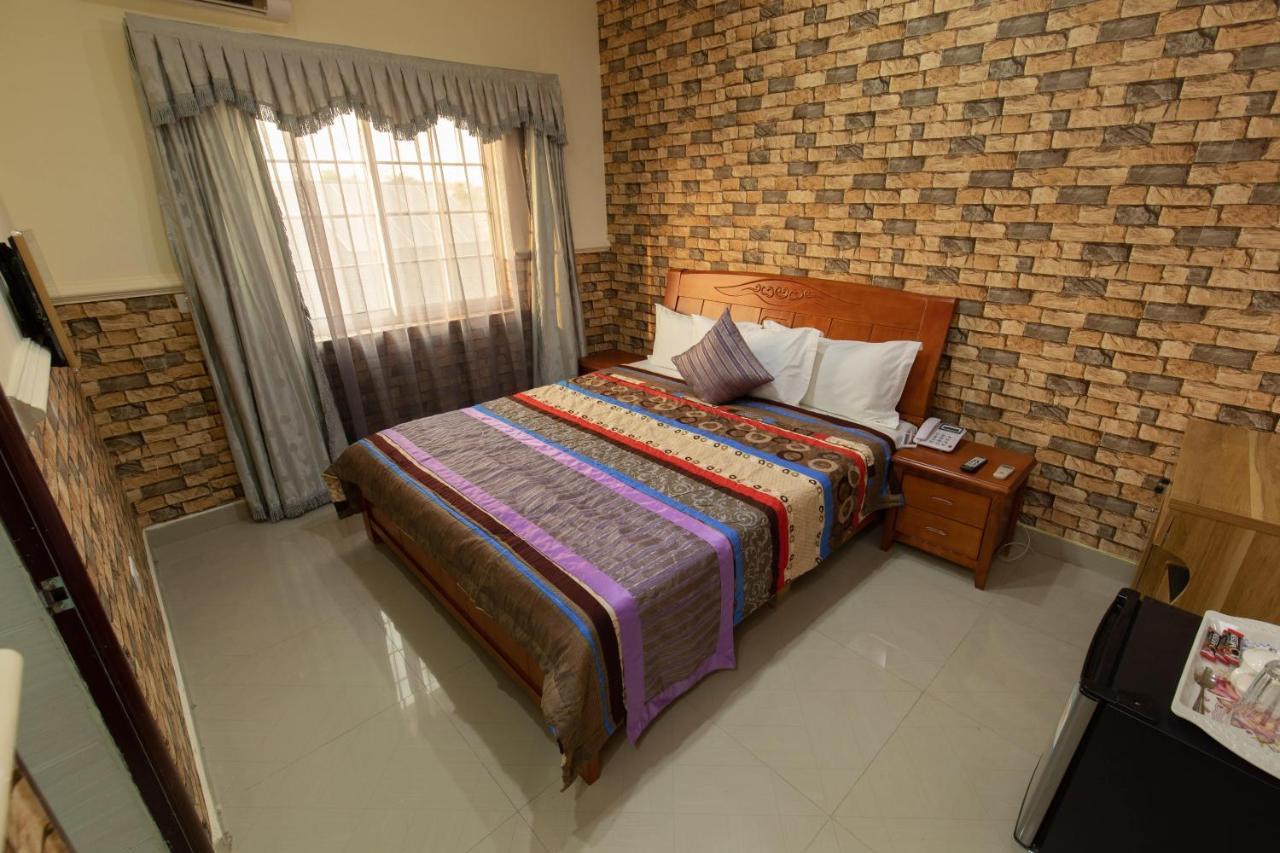 Ag Hotel And Suites Ogbodjo ภายนอก รูปภาพ