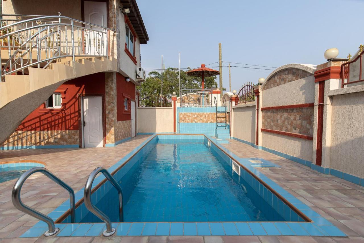 Ag Hotel And Suites Ogbodjo ภายนอก รูปภาพ