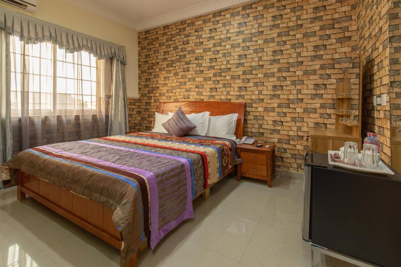 Ag Hotel And Suites Ogbodjo ภายนอก รูปภาพ