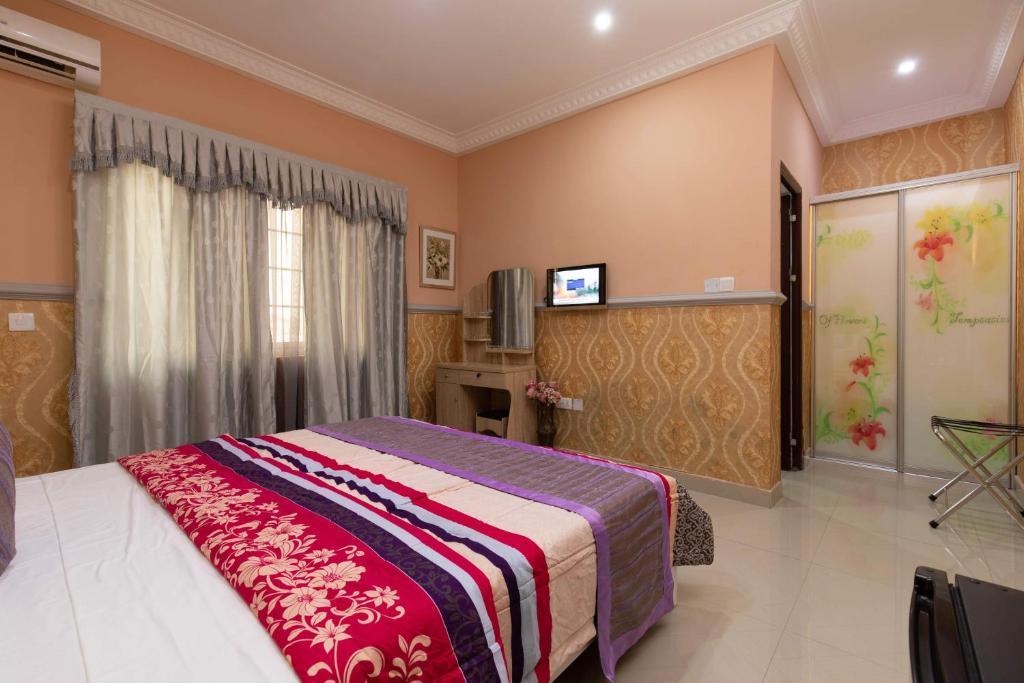Ag Hotel And Suites Ogbodjo ภายนอก รูปภาพ